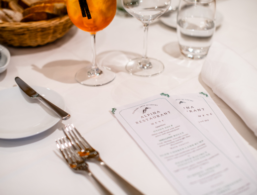 A close shot of cutlery at a table in a restaurant